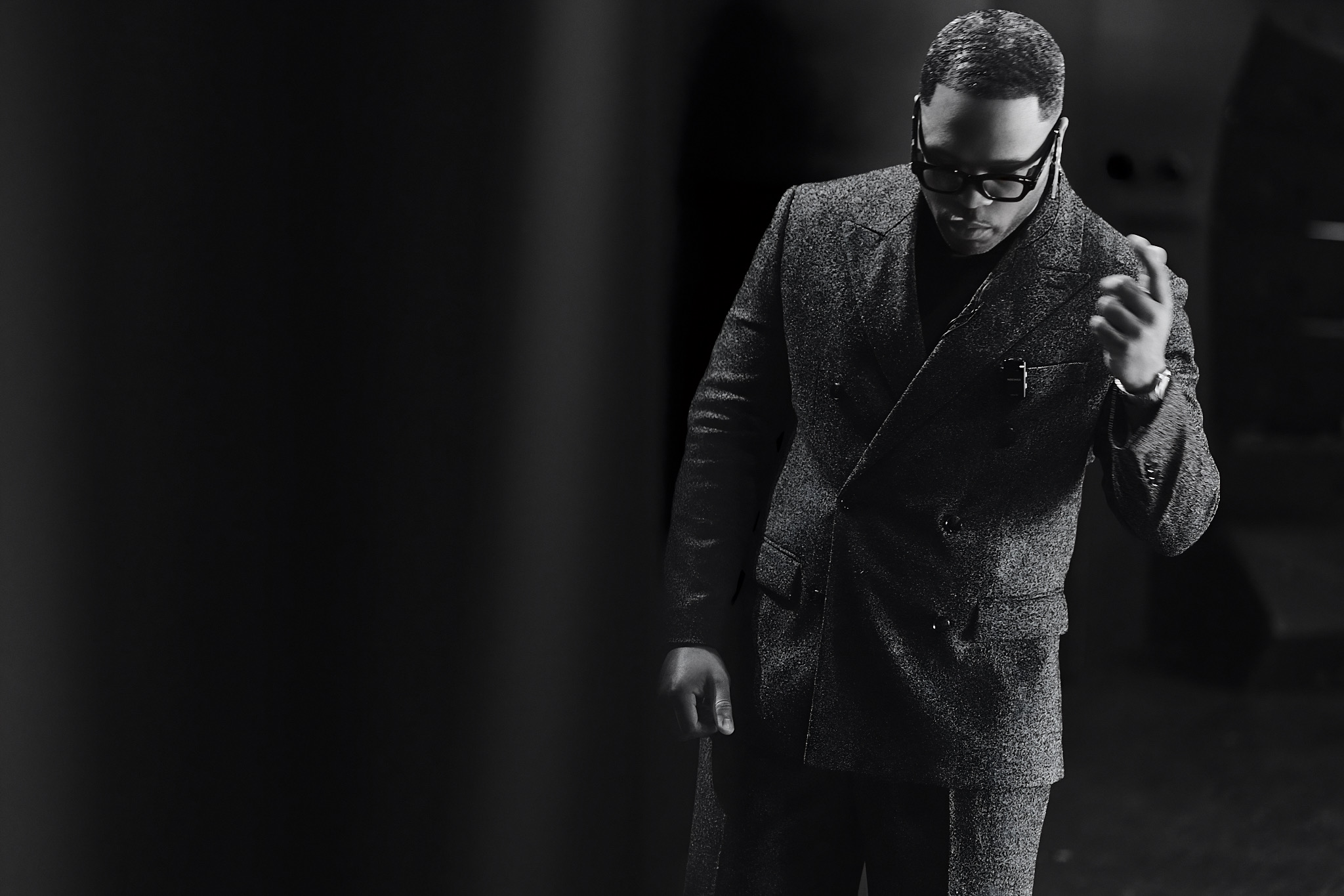Dion Dawson backstage in a tailored suit